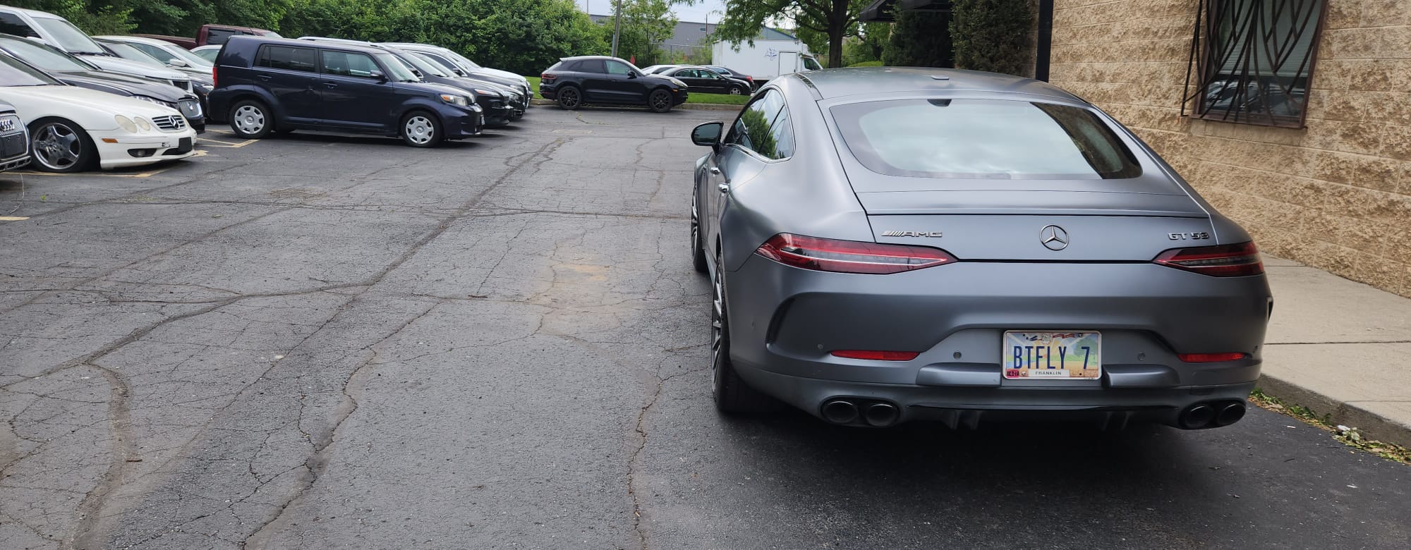 Mercedes-AMG GT 53 rear view with quad exhaust