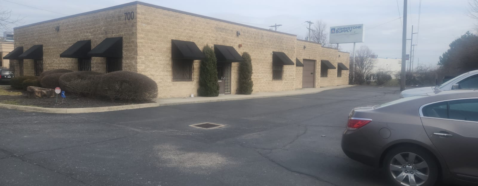 Auto Import Group building exterior at 700 Taylor Ave